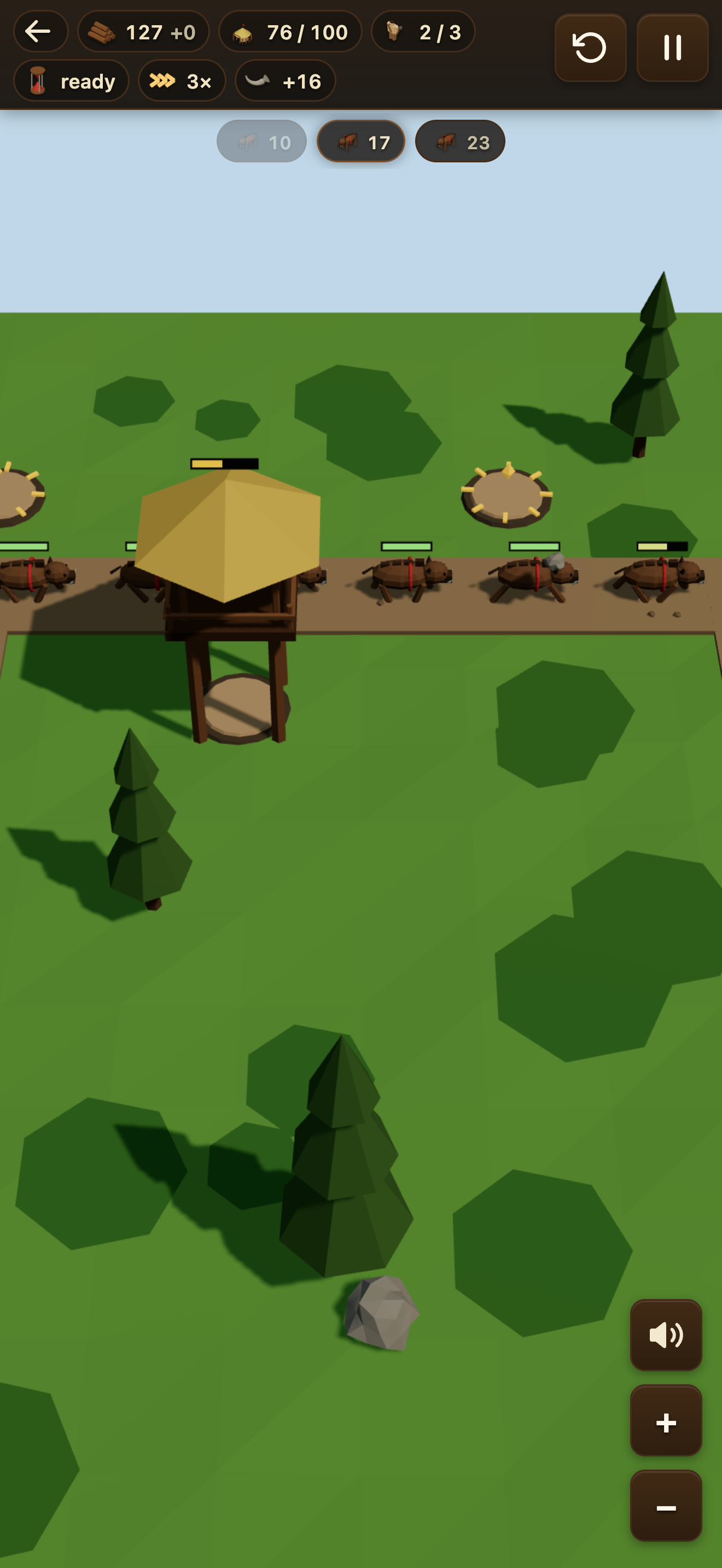 A Stone Age battle in progress — towers firing on the Horde